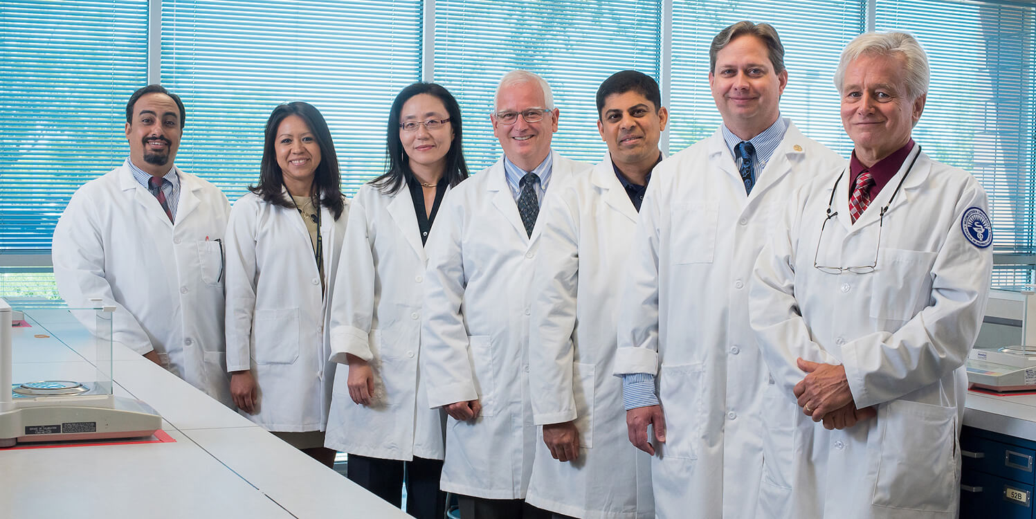 Pharmacists in whitecoats.