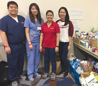 Students and Faculty man makeshift Pharmacy in downtown Houston.